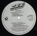 Zee (3) : Identity (LP, Album)