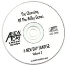 Various : The Churning Of The Milky Ocean - A New Day Records Sampler Volume 2 (CD, Comp, Smplr)