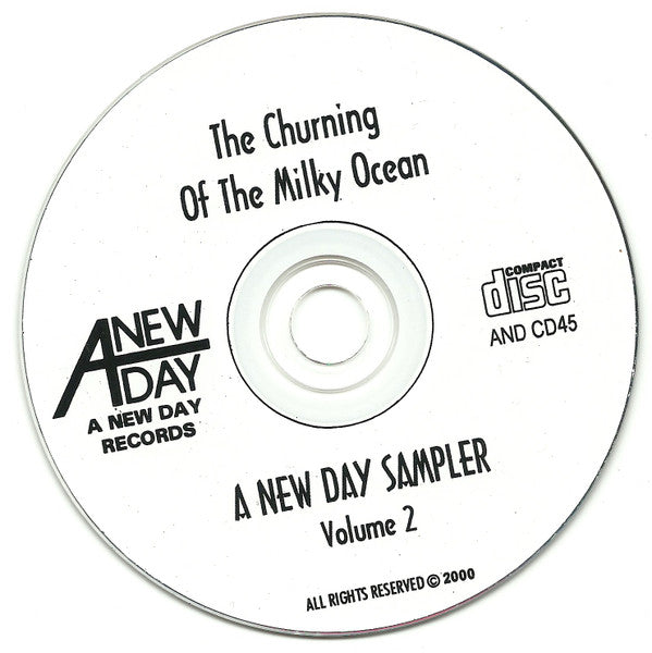 Various : The Churning Of The Milky Ocean - A New Day Records Sampler Volume 2 (CD, Comp, Smplr)