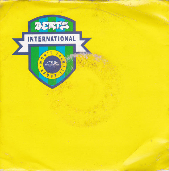 Beats International : Won't Talk About It (7", Single, Ora)