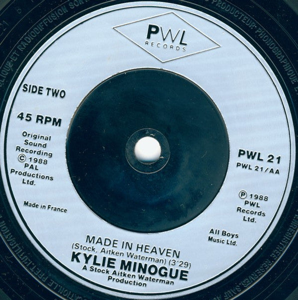 Kylie Minogue : Je Ne Sais Pas Pourquoi / Made In Heaven (7", Single, Sil)