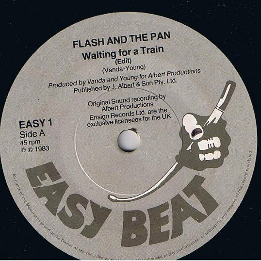 Flash And The Pan* : Waiting For A Train (7", Single)