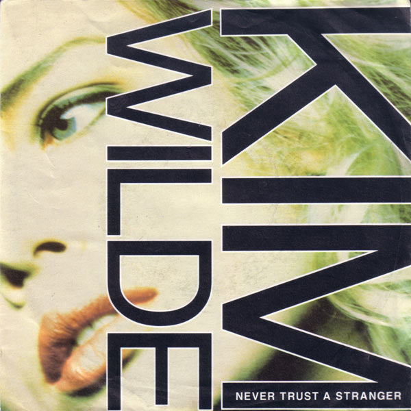 Kim Wilde : Never Trust A Stranger (7", Single, Pap)