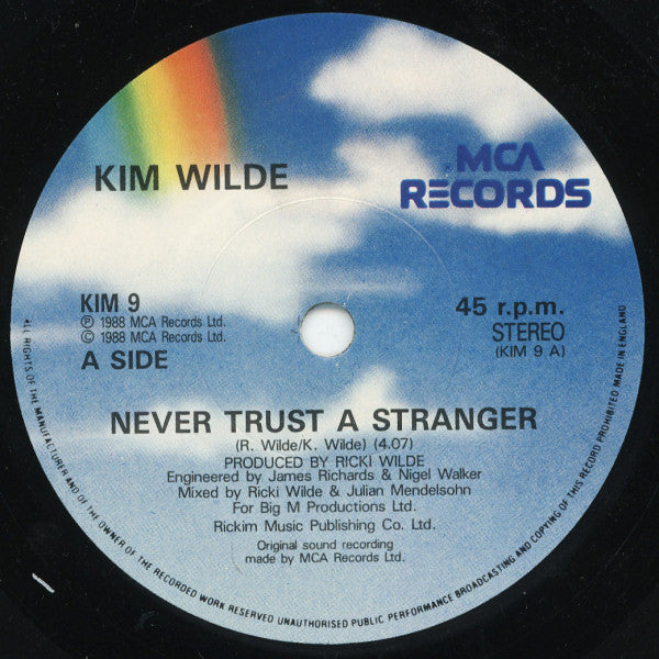 Kim Wilde : Never Trust A Stranger (7", Single, Pap)