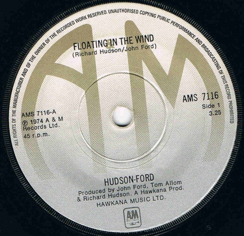 Hudson-Ford : Floating In The Wind (7", Single, Sol)