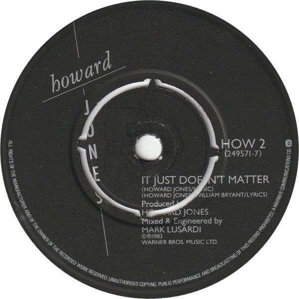 Howard Jones : What Is Love? (7", Single, Pus)