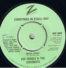 Kid Creole And The Coconuts : Christmas In B'Dilli Bay (7", Single)