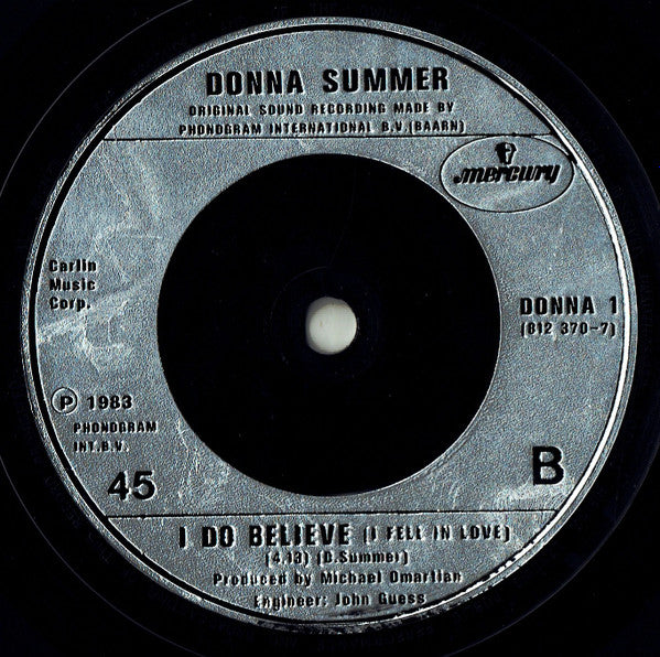 Donna Summer : She Works Hard For The Money (7", Single)
