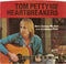 Tom Petty And The Heartbreakers : Here Comes My Girl (B/W) Louisiana Rain (7", Single, Glo)
