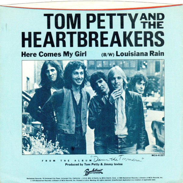 Tom Petty And The Heartbreakers : Here Comes My Girl (B/W) Louisiana Rain (7", Single, Glo)
