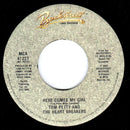 Tom Petty And The Heartbreakers : Here Comes My Girl (B/W) Louisiana Rain (7", Single, Glo)