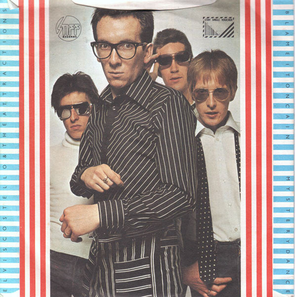 Elvis Costello : Watching The Detectives (7", Single, RP, Lyn)