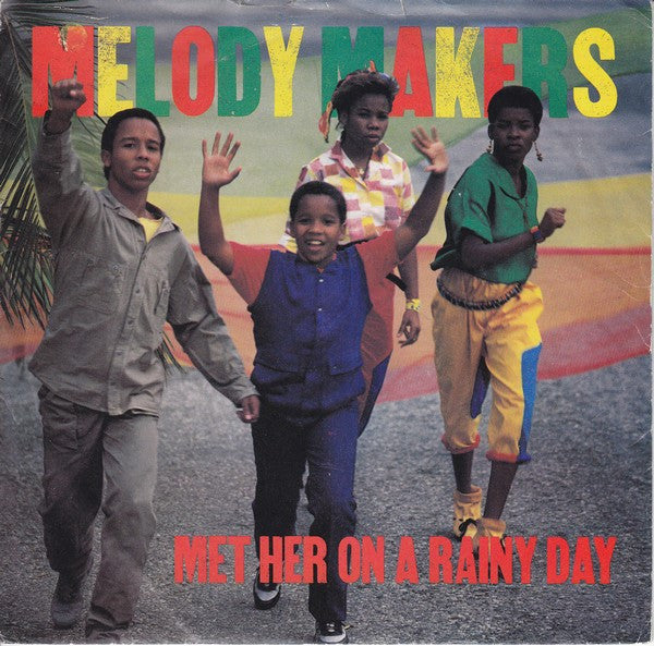 The Melody Makers : Met Her On A Rainy Day (7", Single)