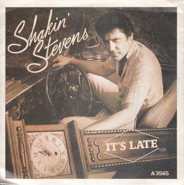 Shakin' Stevens : It's Late (7", Single, Blu)