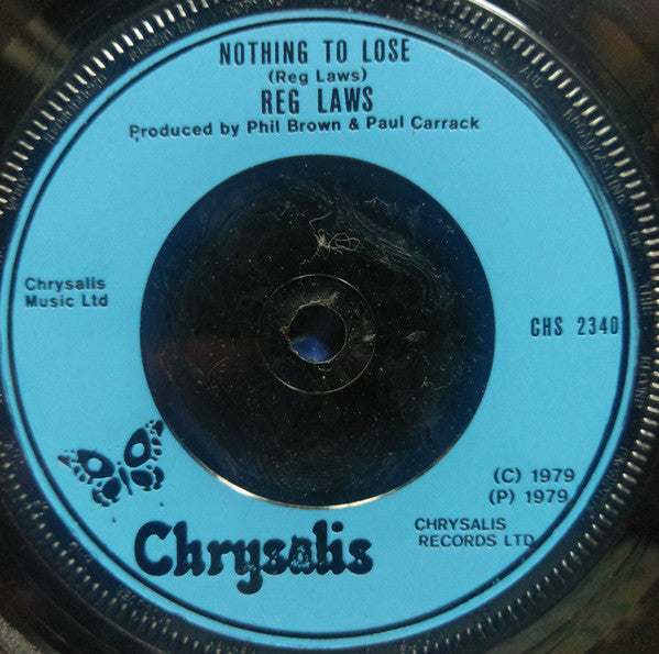 Reg Laws : Rebel (7", Blu)