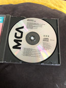 Jimmy Buffett : Riddles In The Sand (CD, Album, RE)