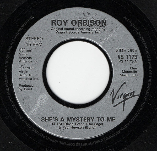 Roy Orbison : She's A Mystery To Me (7", Single, Cor)