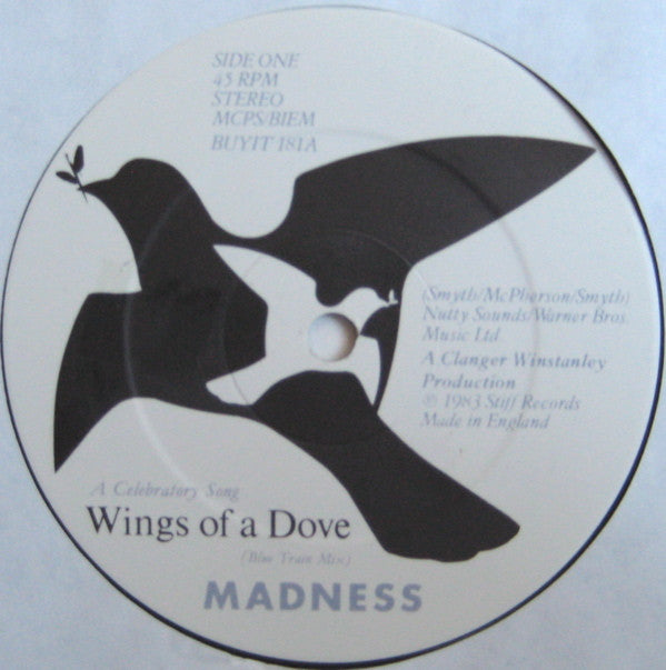 Madness : Wings Of A Dove (12", Single, Emb)