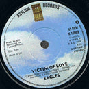 Eagles : New Kid In Town (7", Single, Sol)