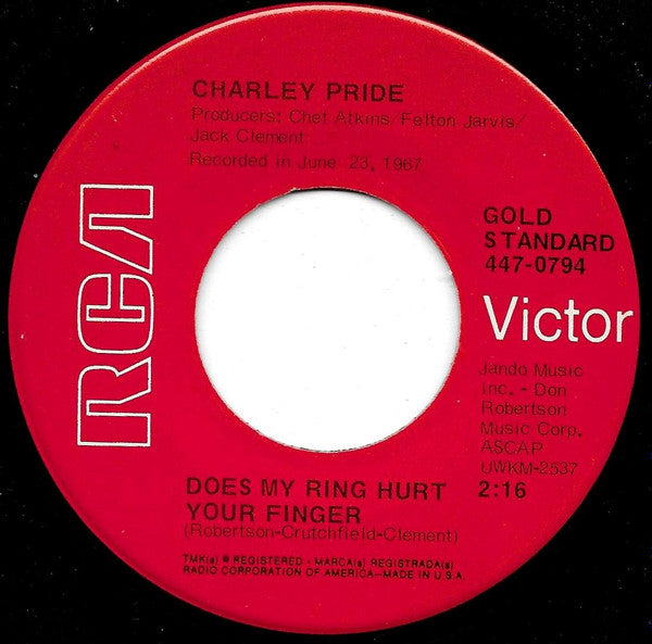 Charley Pride : The Day The World Stood Still (7", Single, RE)