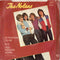 The Nolans : Attention To Me (7", Single, Pap)