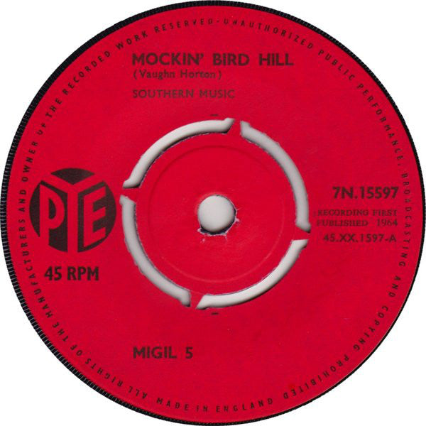 Migil 5* : Mockin' Bird Hill (7", Single, Kno)
