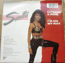 Sinitta : Hitchin' A Ride (7", Single, Pap)