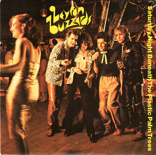 Leyton Buzzards : Saturday Night Beneath The Plastic Palm Trees (7", Single, Blu)