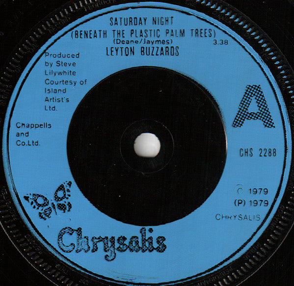 Leyton Buzzards : Saturday Night Beneath The Plastic Palm Trees (7", Single, Blu)