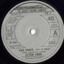 Elton John : Sad Songs (Say So Much) (7", Single, Pap)