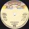 Ultimate (3) : Ritmo De Brazil / Touch Me Baby (7", Single, sol)