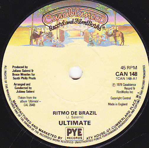Ultimate (3) : Ritmo De Brazil / Touch Me Baby (7", Single, sol)