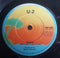 U2 : 11 O'Clock Tick Tock (7", Single, Sol)