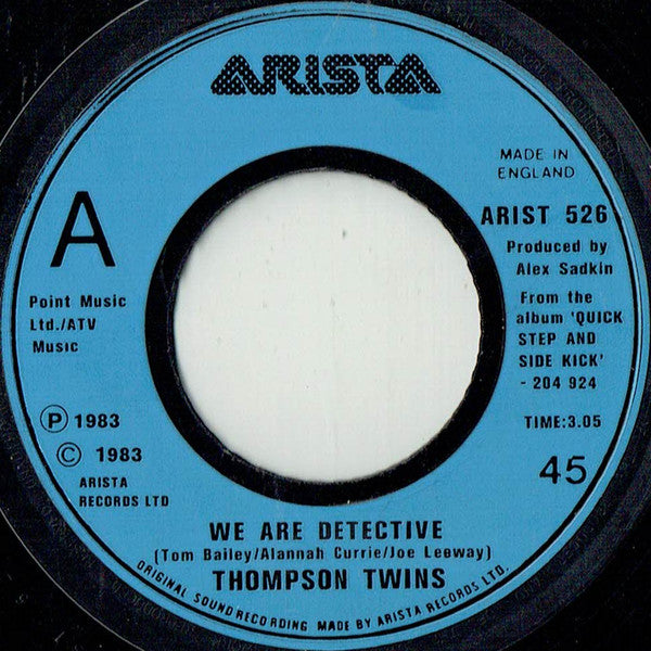 Thompson Twins : We Are Detective (7", Single, Lar)