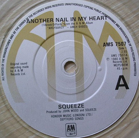 Squeeze (2) : Another Nail In My Heart (7", Single, Cle)