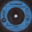 The Osmonds : Love Me For A Reason (7", Single, Inj)