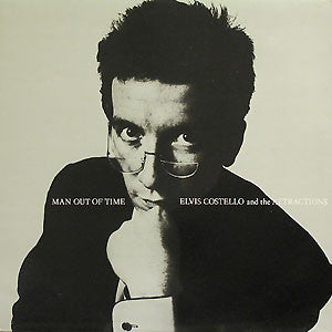 Elvis Costello & The Attractions : Man Out Of Time (12", Single, Ltd)
