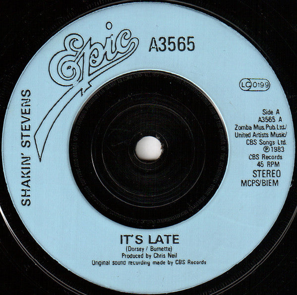 Shakin' Stevens : It's Late (7", Single, Blu)