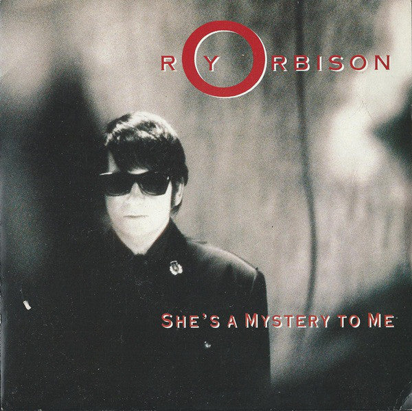 Roy Orbison : She's A Mystery To Me (7", Single, Cor)