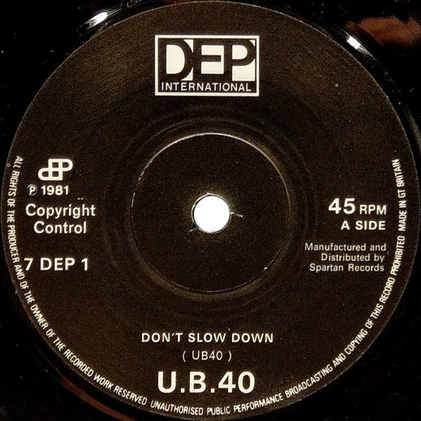 UB40 : Don't Slow Down / Don't Let It Pass You By (7", Single)