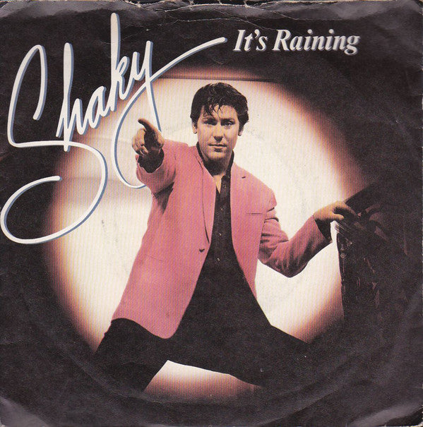 Shakin' Stevens : It's Raining (7", Single, Blu)