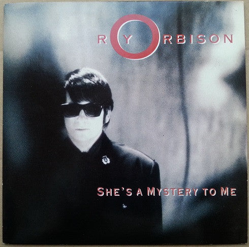 Roy Orbison : She's A Mystery To Me (7", Single, Bla)
