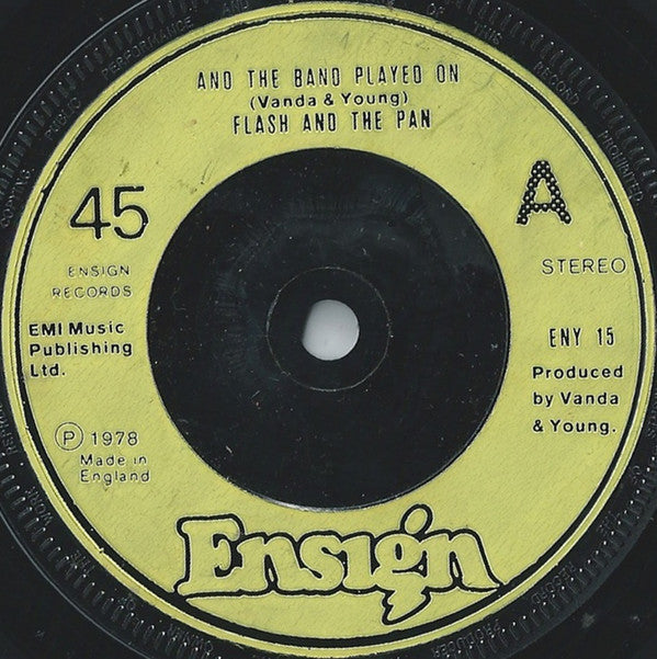 Flash & The Pan : And The Band Played On (7", Single, Gre)