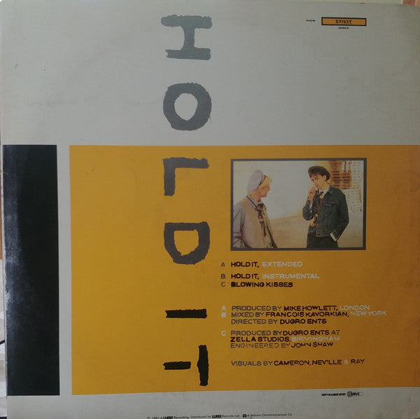 Tin Tin (4) : Hold It (12", Single)